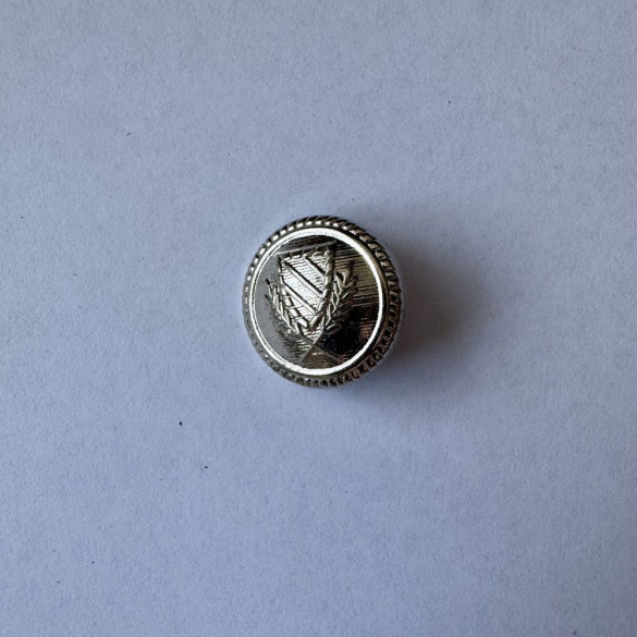 Bouton métallique gris avec blason 20 mm - Découvrez des centaines de modèles !
